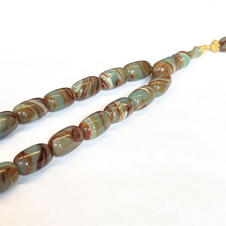 Capsule-Cut Countersunk-Drilled Catalin Tasbeeh with Silver Imam Bead – WATD425